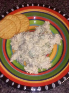 A picture of Chicken salad with grapes.