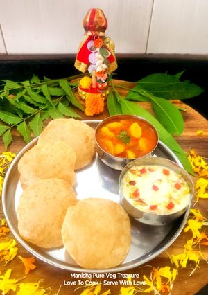 A picture of Tutti Frutti Dryfruits Kesar Shrikhand - Puri With Rasedar Aloo Sabzi - Gudi Padwa /Ugadi Special.