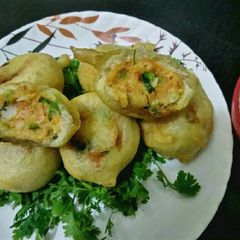 Cheese chilli dosa bonda A picture of Cheese chilli dosa bonda.