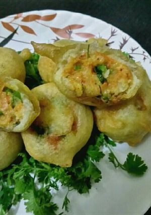 A picture of Cheese chilli dosa bonda.