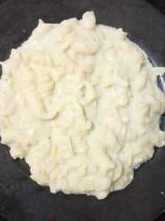 A picture of Pasta with homemade white sauce.