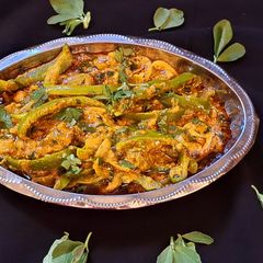 A picture of Unique style Simla mirch masala curry.