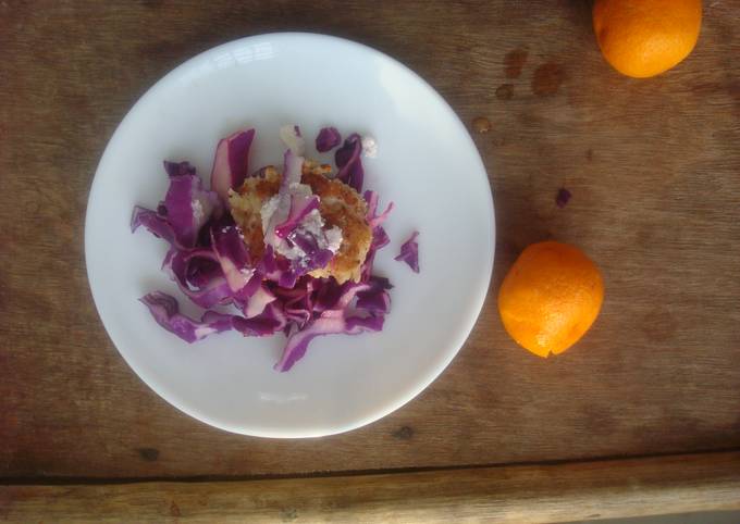 Purple cabbage salad with grilled chicken breast, feta, and citrus dressing