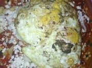 Una foto de chilaquiles con totopos