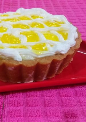A picture of Pineapple cheese cake tarts.