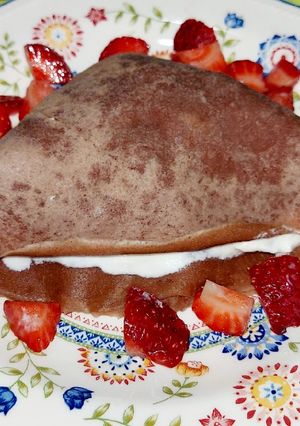 Una foto de Creps de chocolate con crema mascarpone y fresas