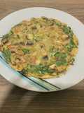 Omelette de espinaca, cebolla y champiñones