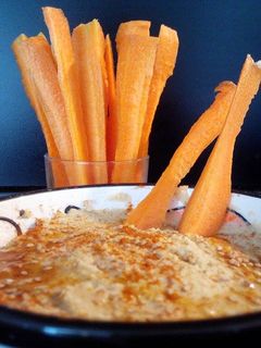 Una foto de Hummus (comida arabe)