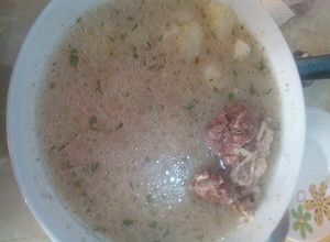 Una foto de Caldo de cordero con mote