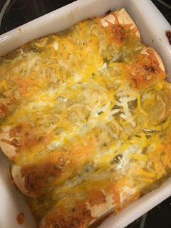 A picture of Fajita green chile enchiladas.