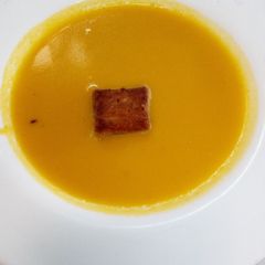 Carrot soup and croûton A picture of Carrot soup and croûton.