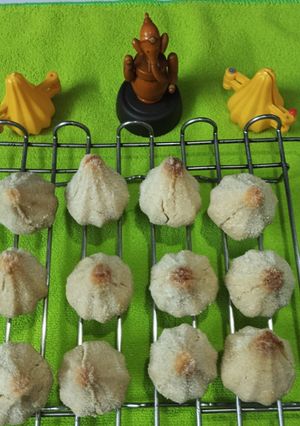 A picture of Stuffed Rava Atta Modak Cookies.
