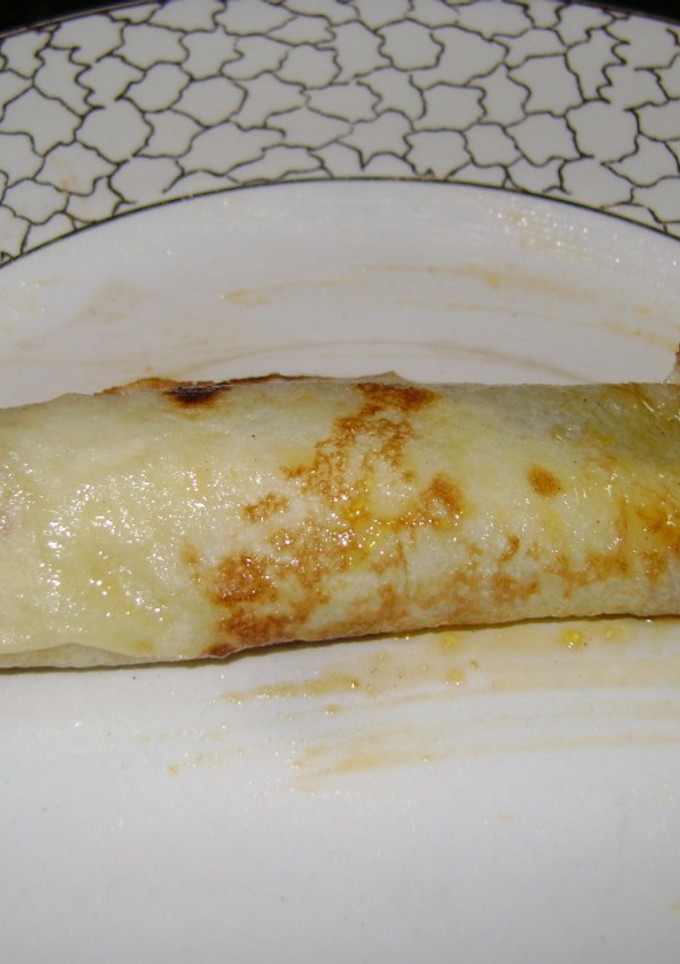 Una foto de Panqueques con dulce de leche (opcional flambeados)