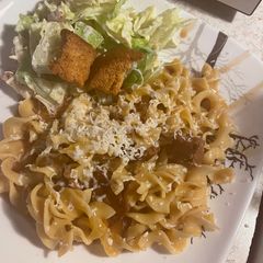 A picture of French onion beef and noodles.