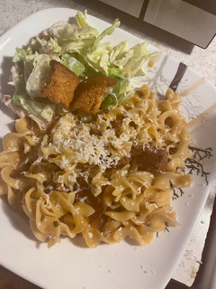 A picture of French onion beef and noodles.