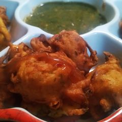 A picture of Crispy onion pakordy 😋.