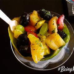 A picture of Summer Fruits Bowl with Minty Dressing.