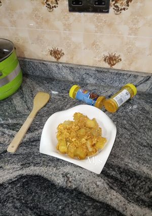 A picture of Scrambled eggs and yam.