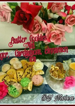 A picture of Butter Cookies With Ginger Cardomon Cinnamon Tea.