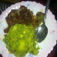 A picture of Mashed potatoes,added some kunde and pumpkin leaves.