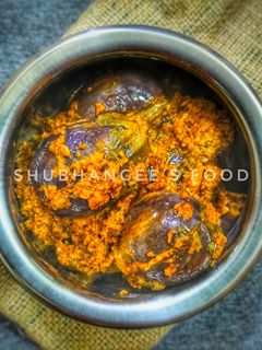 भरली मसाला वांगी (bharli masala vangi recipe in marathi) रेसिपी चे मुख्य फोटो