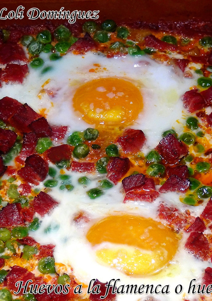 Una foto de Huevos a la flamenca o huevos al plato