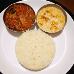A picture of Bitter gourd gravy with rice.