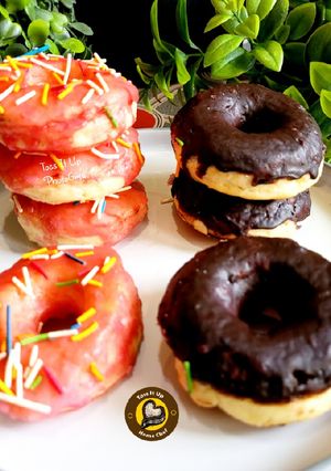 A picture of No knead baked donuts with 2 different glaze.