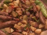 صينيه بطاطس بالسجق