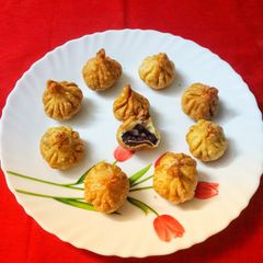 A picture of Fried  Mawa Chocolate Modak.