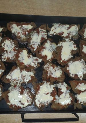 Una foto de Milanesas a la napolitana