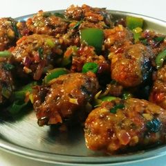 A picture of Vegetable Manchurian Dry.