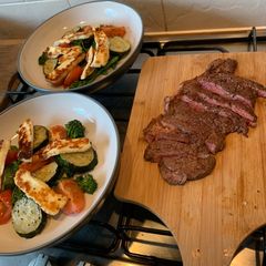 A picture of Marinated steak, warm Halloumi and roast vegetable salad.