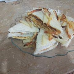 Tandoori Chicken Club Sandwich A picture of Tandoori Chicken Club Sandwich.