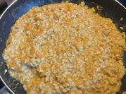 Una foto di risotto rosmarino e zucca