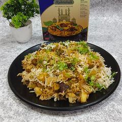 A picture of Hyderabadi Biryani with Daawat Biryani Kit.