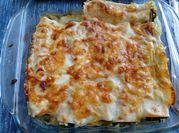 Una foto de canelones espinaca