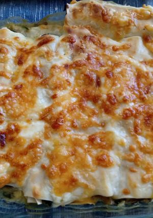 Una foto de Canelones de espinaca y boloñesa