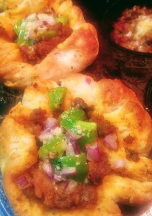 A picture of Mini Pizza Pot Pies.