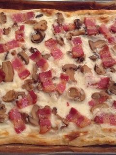 Una foto de Pizza carbonara