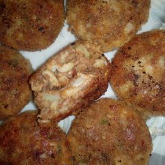 A picture of Chicken potato macron kabab.