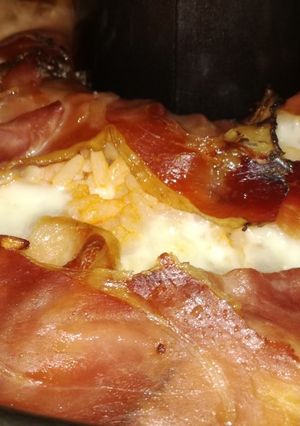 A picture of Rice Timbale with Smoked Scamorza and Speck.
