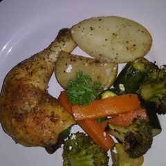 Roast chicken and vegetables A picture of Roast chicken and vegetables.
