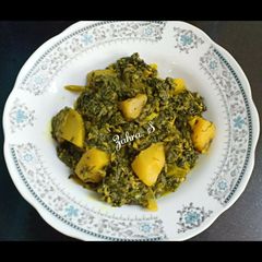 A picture of Paalak Aloo Sabzi.