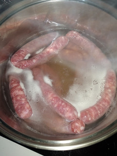 Una foto de Salchichas al vino