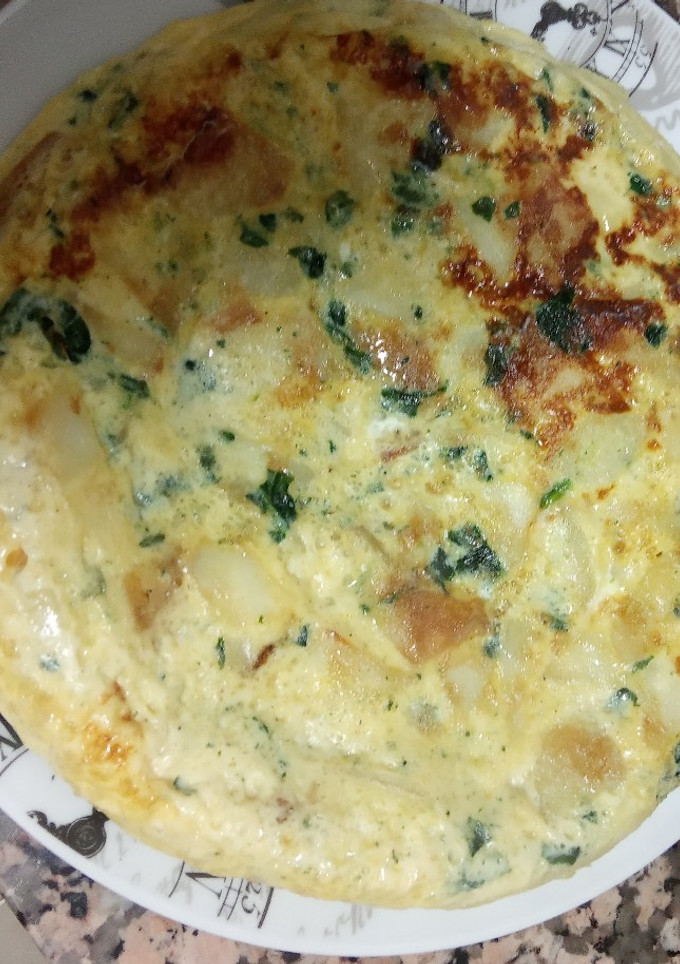 Una foto de Tortilla de patatas con espinacas.(A mi manera)