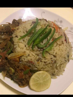 A picture of Onion Rice with minced meat sauce.