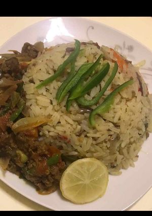 A picture of Onion Rice with minced meat sauce.