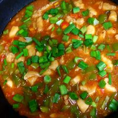 A picture of Chicken Shashlik with gravy.