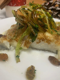 Una foto de Bacalao gratinado